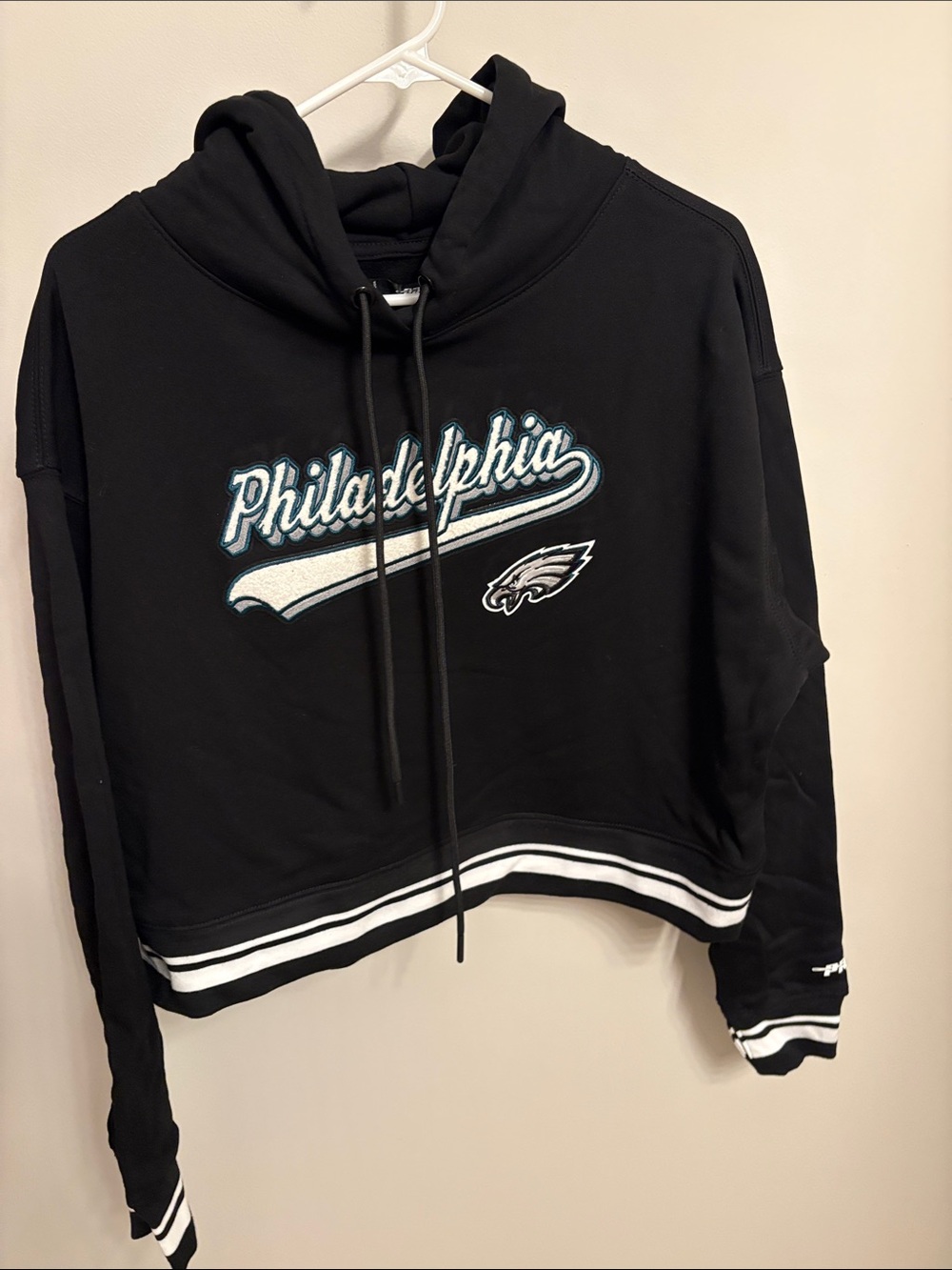NFL Black Cropped Hoodie with White and Teal Philadelphia Script